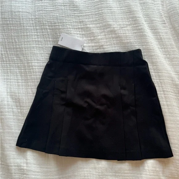 Black pleat mini skirt. NWT - Picture 2 of 3